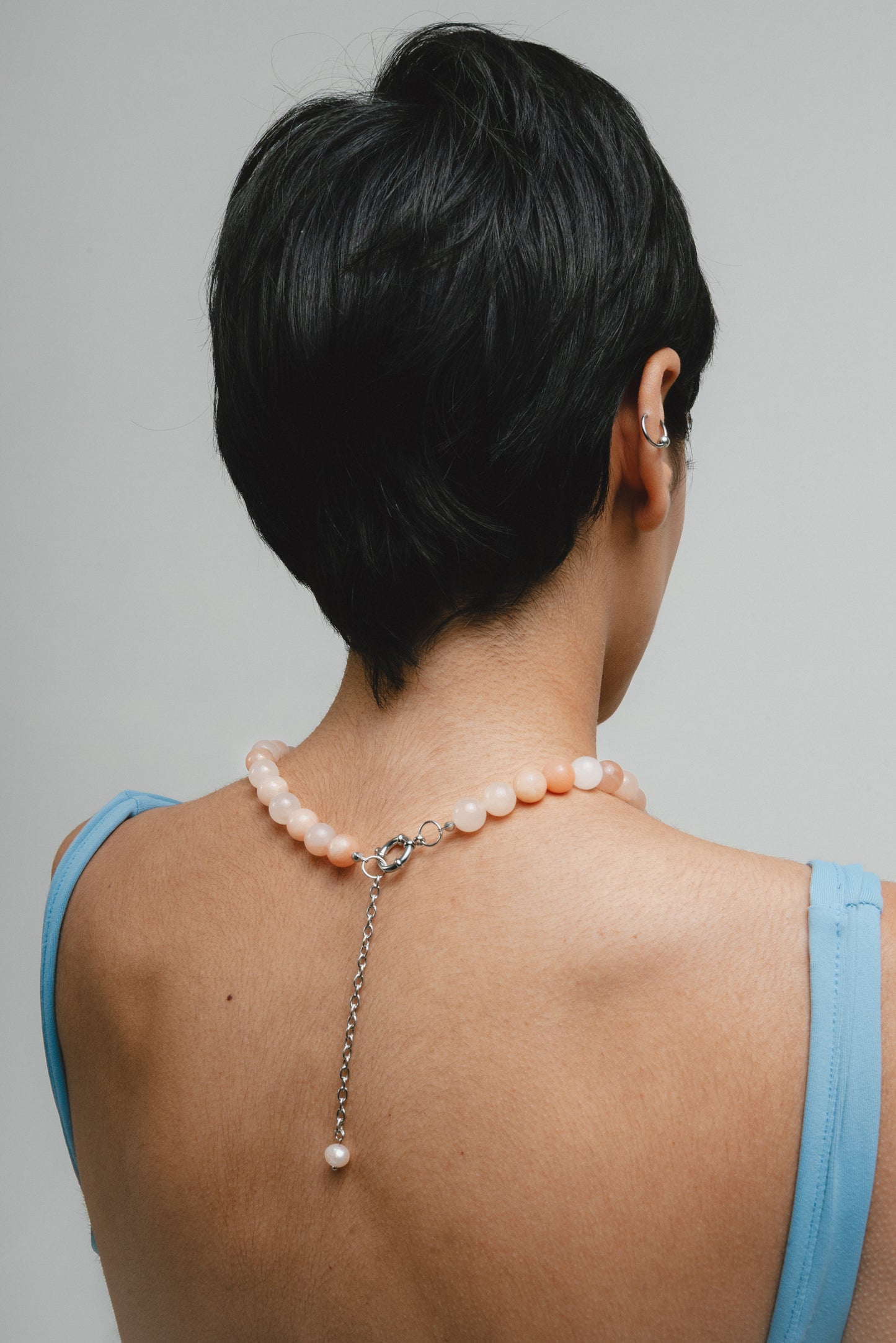 Elegant peach bead necklace from rose quartz with silver clasp and drop chain accent with river pearl, handmade from natural stones