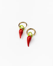 Gold hoop earrings with red chili pepper-shaped pendants made from recycled glass