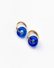Deep blue hoop earrings on a base of gold stainless steel, made from recycled glass