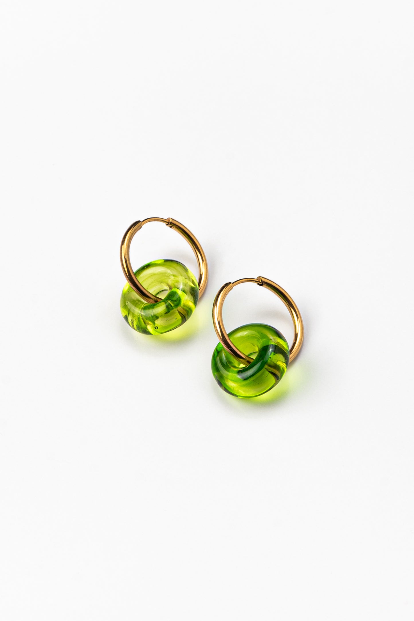 Green hoop earrings on a base of gold stainless steel, made from recycled glass