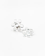 Pair of clear glass stud earrings arranged in a circular floral cluster design, made from recycled glass
