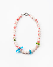 Necklace made of round pink-and-white gemstones, green river pearls and colorful recycled glass accents in blue and green, finished with a silver clasp