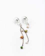 Drop earrings with clear shell-shaped studs made of recycled glass. Each earring has a silver chain hanging down, with small round pearls in green, orange, and white attached at different points along the chain.