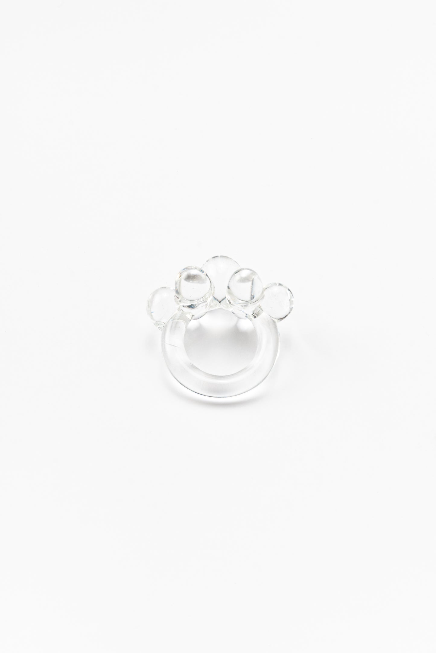 Clear ring featuring a cluster of small transparent glass spheres on top, made from recycled glass