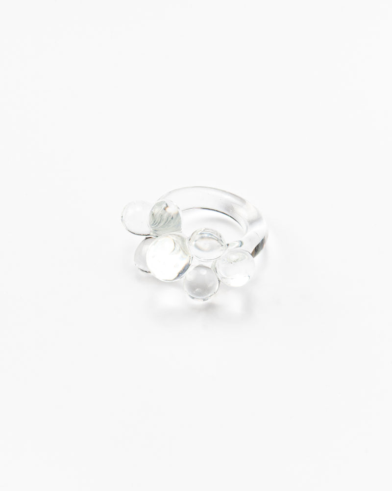 Clear ring featuring a cluster of small transparent glass spheres on top, made from recycled glass