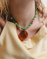 Handmade colorful necklace with a large amber pendant