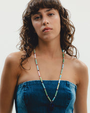 Colorful handmade  beaded necklace with a blue pendant 