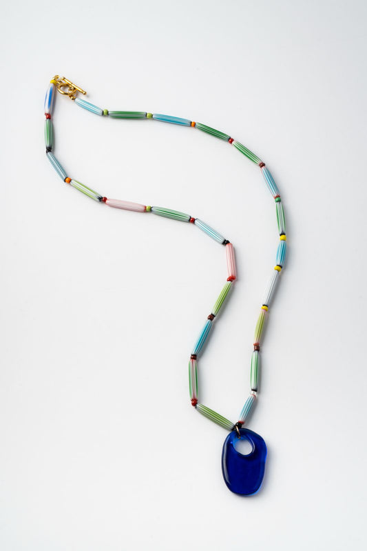 Colorful handmade  beaded necklace with a blue pendant 