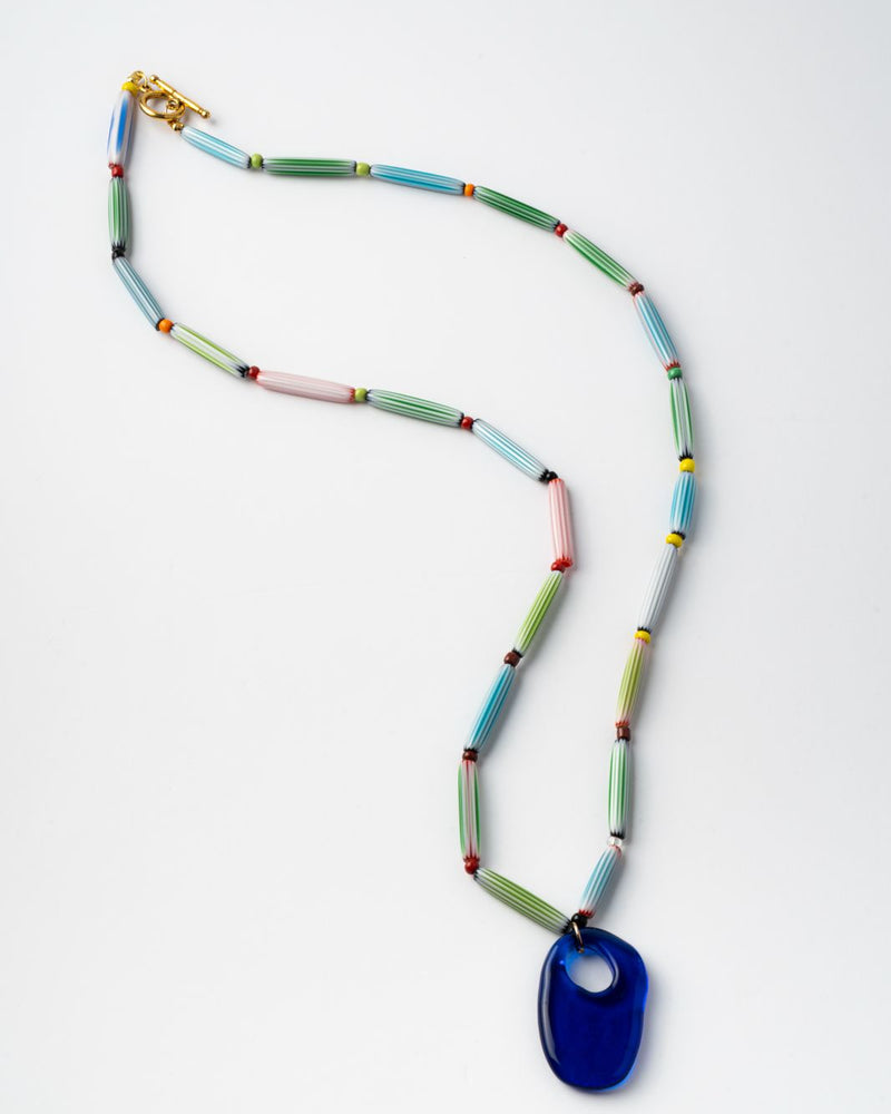 Colorful handmade  beaded necklace with a blue pendant 